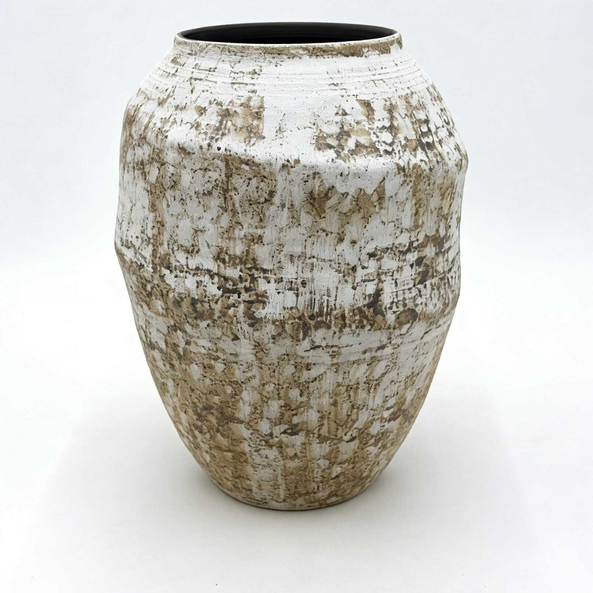 Batur Ceramic Vase — Textured ovoid ceramic vase.