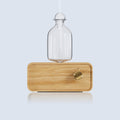 Mulan Wood and Glass Aroma Diffuser — Wooden rectangular diffuser base with a glass chamber.
