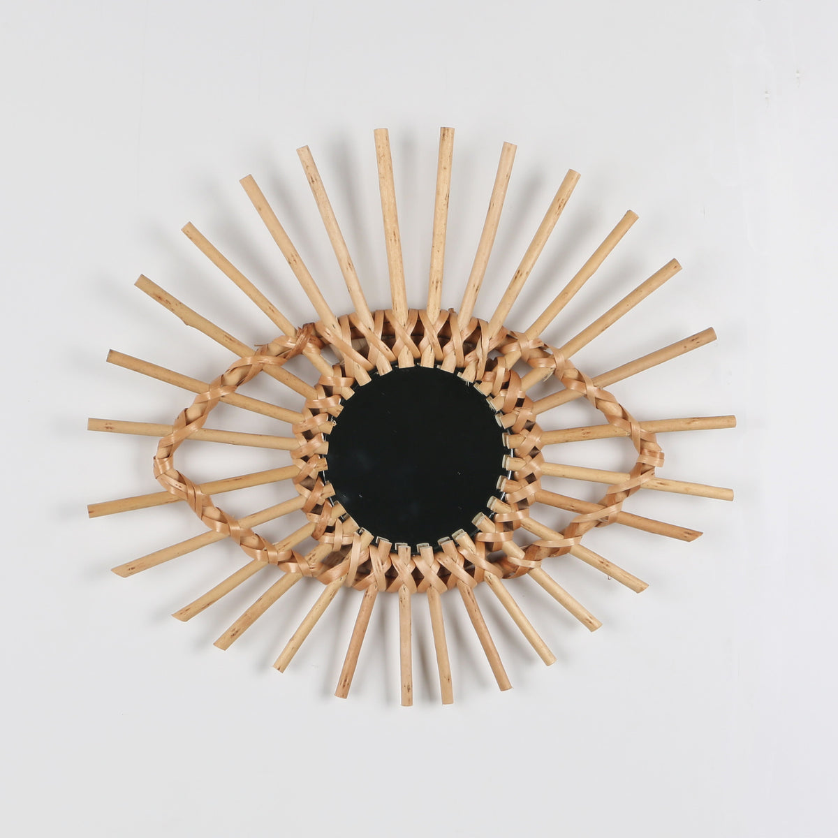 Changshu Wall Mirror — Round sunburst rattan wall mirror, in the selected B design.