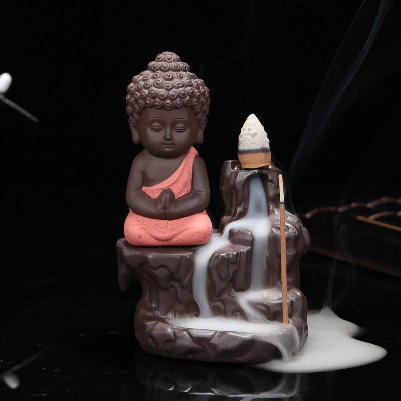 Teshima Buddha Incense Burner — Red seated Buddha figurine with a backflow incense channel.