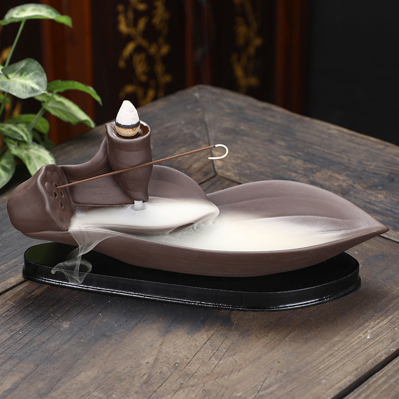Xinyi Incense Burner — Brown folded-leaf ceramic backflow incense plate.