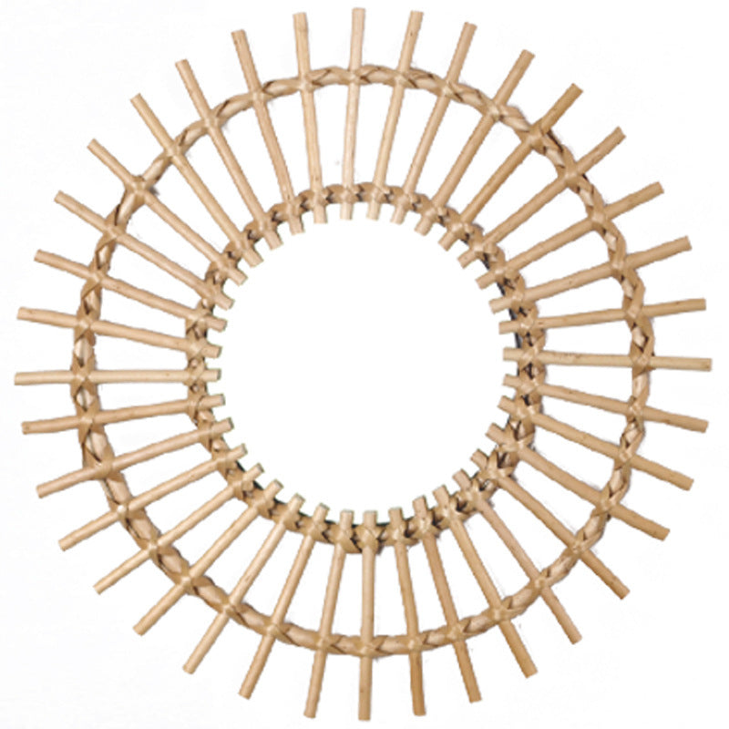 Bumi Round Decorative Mirror — Round sunburst-style framed mirror.