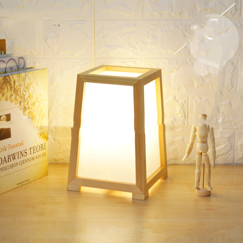 Pati Table Lamp — Open rectangular bamboo-and-wood table lamp.
