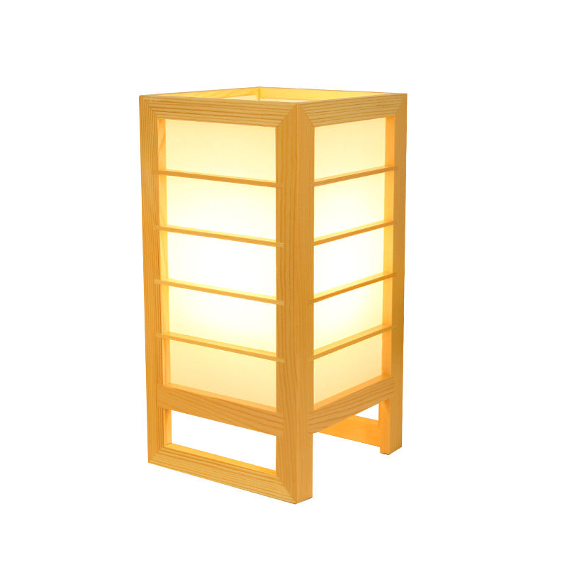 Pamekasan Table Lamp — Rectangular bamboo-and-wood table lamp with pale light-diffusing panels.