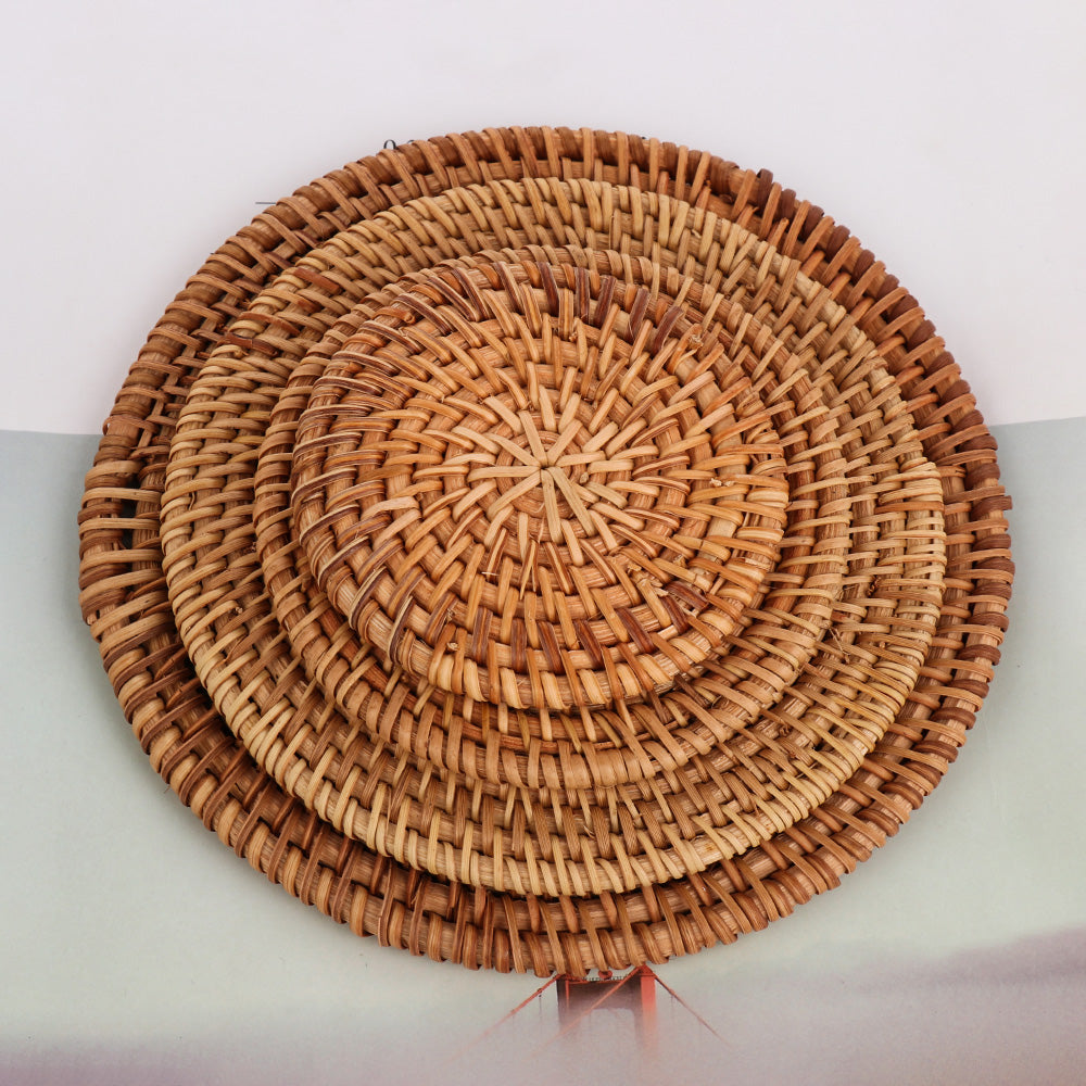 Yunan Coaster — Round woven rattan coaster in the selected 20 cm size.