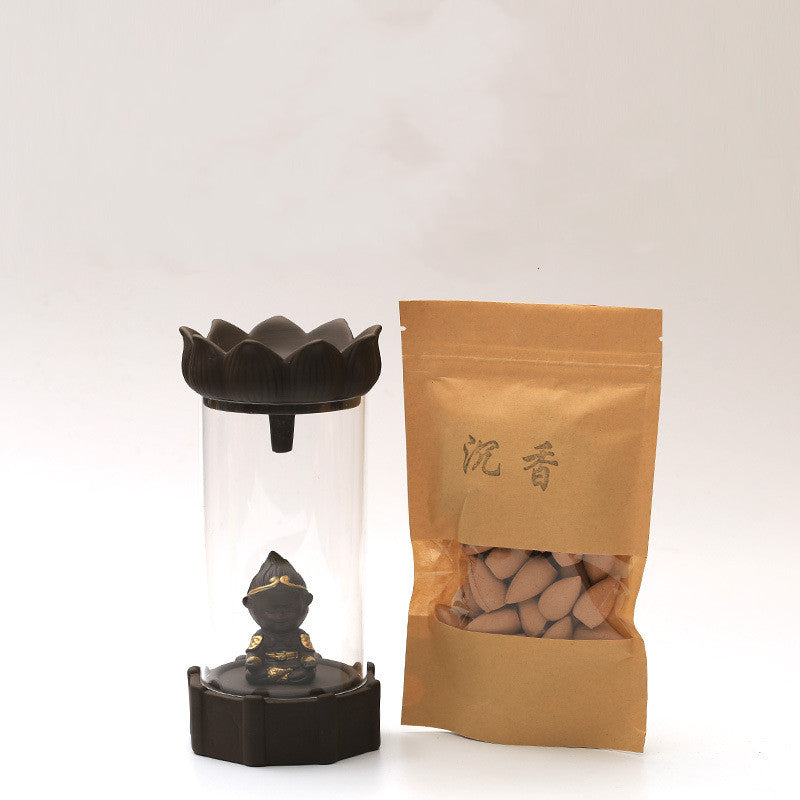 Ise Incense Holder — Glass incense chamber with a seated figurine, in the selected D design.