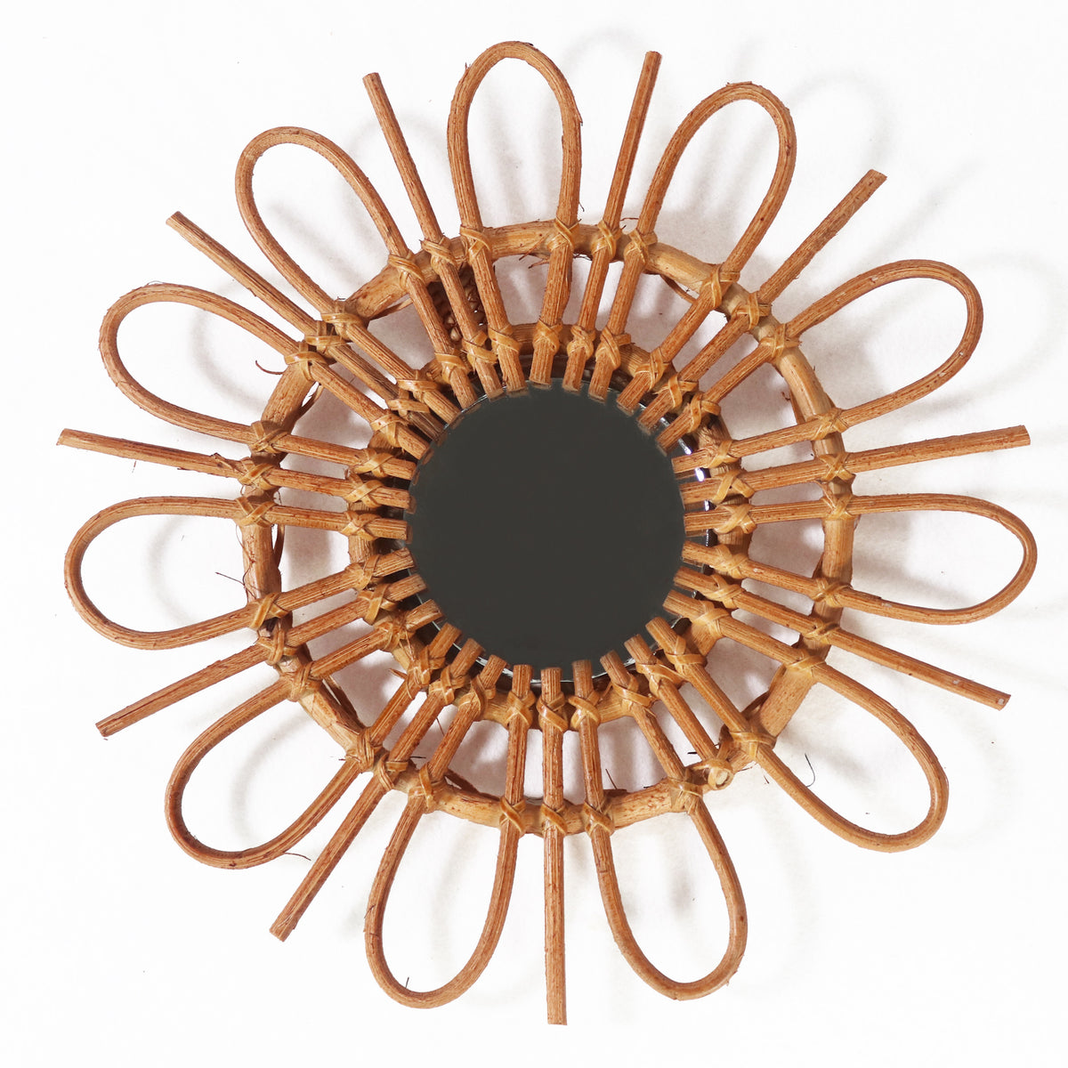 Yunshan Decorative Mirror — Round mirror with a loop-petal woven frame.