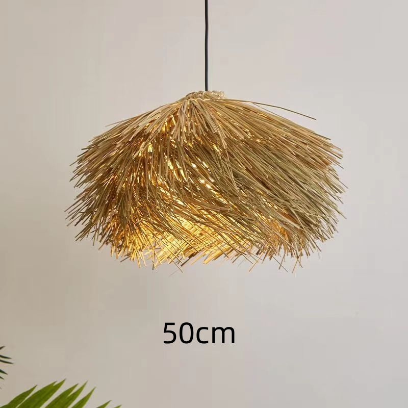 Kemuning Woven Pendant Light — Fringed woven pendant shade with a rounded profile.