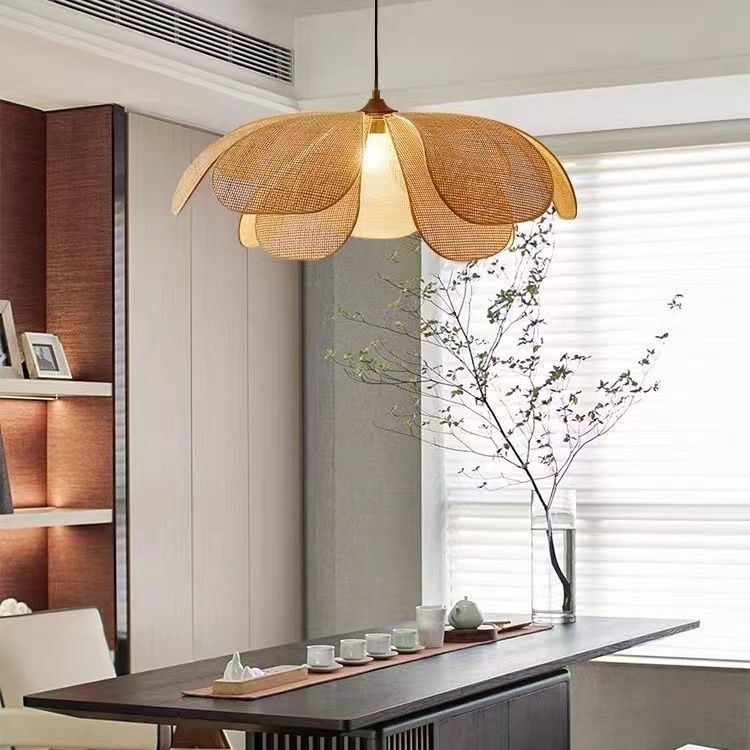 Yueying Rattan Pendant Light — Large rounded petal-shaped woven pendant shade.