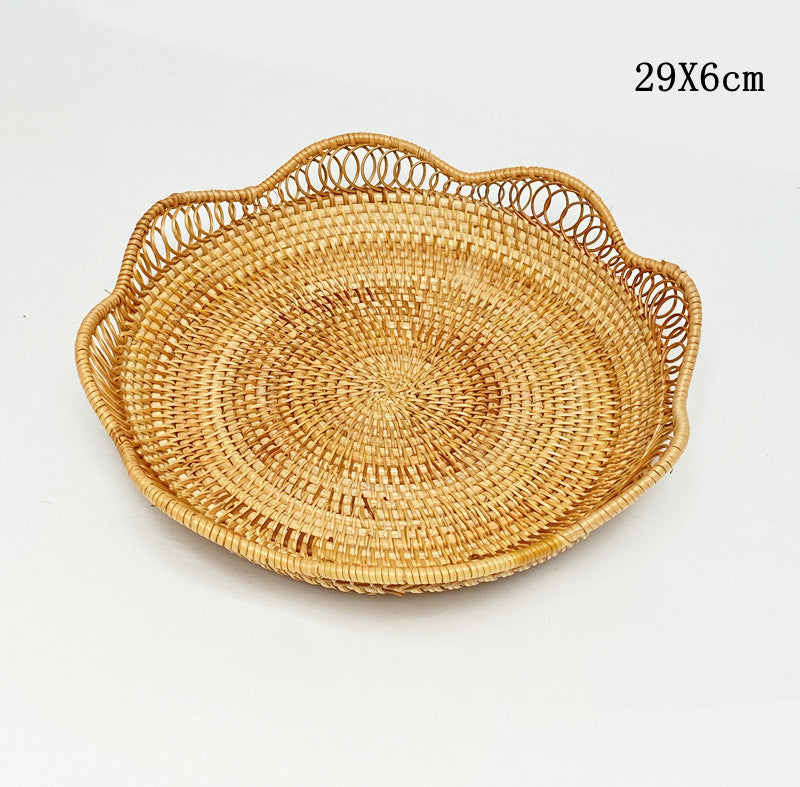 Karimun Serving Plate — Scalloped round woven serving plate with loop handles.