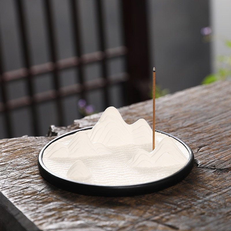 Kutai Incense Holder — White mountain-shaped ceramic incense holder.