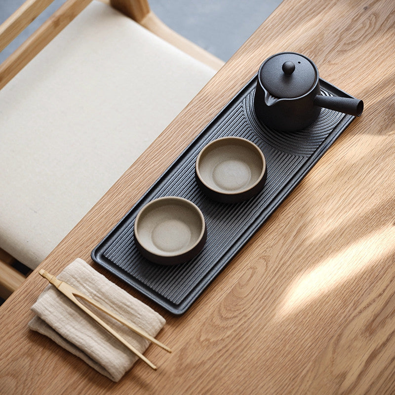 Yutaka Ceramic Tea Set — Brown glazed ceramic teapot and two cups with a long ceramic tray.