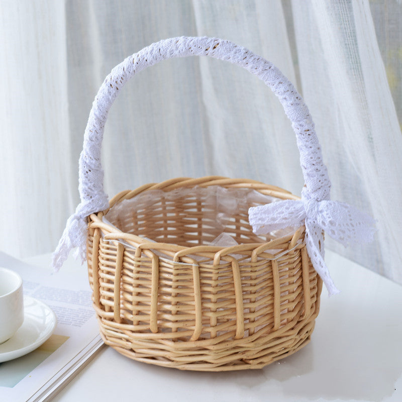 Brebes Storage Basket — Small round basket with an arched carrying handle.