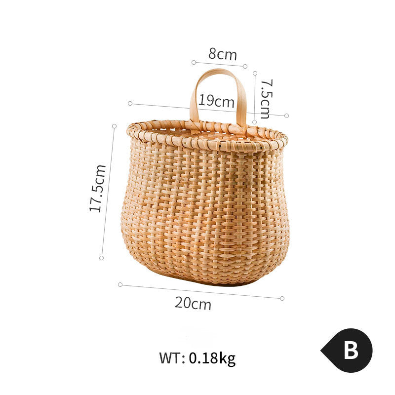 Ashiya Storage Basket — Rounded woven basket with a short loop handle.