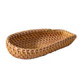 Indah Serving Basket — Oval woven serving basket.