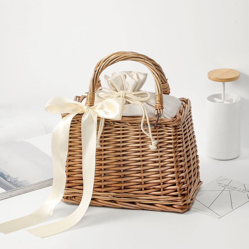 Lingnan Woven Handbag — Woven handbag with carry handles and a light-coloured ribbon, model B.