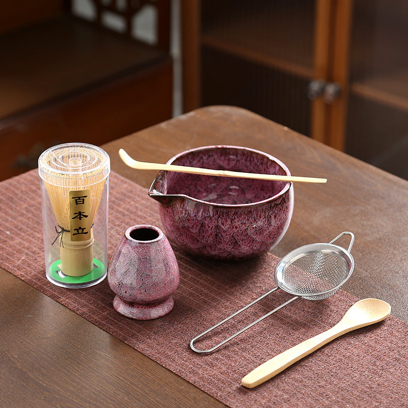 Hino Matcha Tea Set — Pink glazed matcha bowl with preparation tools and gift packaging.