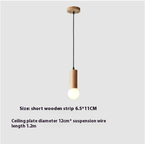 Isumi Pendant Light — Single-head 11 cm wooden pendant with an E27 fitting; bulb not included.