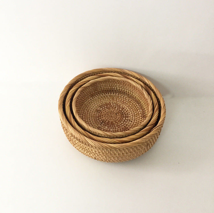 Bangli Storage Basket — Three nesting round woven bowls in different sizes.