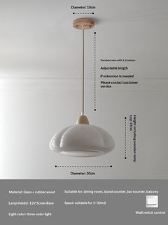 Kashima Pendant Light — White scalloped glass pendant shade with a wooden stem.