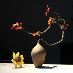 Hualin Vase — Angular ceramic vase with a warm brown glazed finish.
