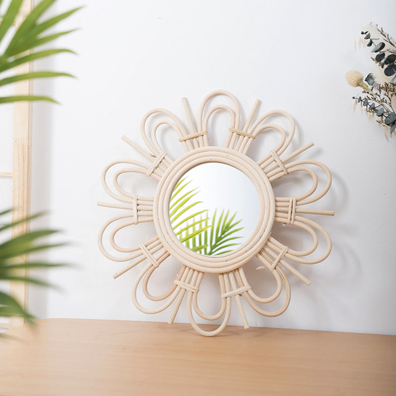 Bengkulu Wall Mirror — Round mirror with a loop-flower rattan frame.