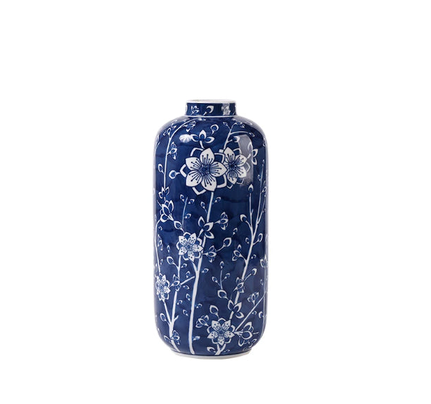 Pelangi Ceramic Vase — Tall cylindrical blue-and-white floral ceramic vase.