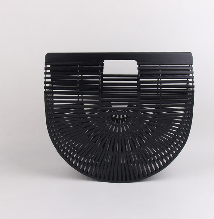 Kariya Wooden Slat Handbag — Black semicircular slatted wooden handbag.