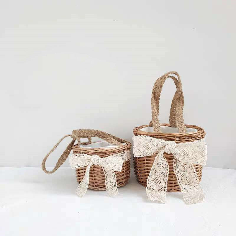 Bima Storage Basket — Woven basket with a carrying handle.