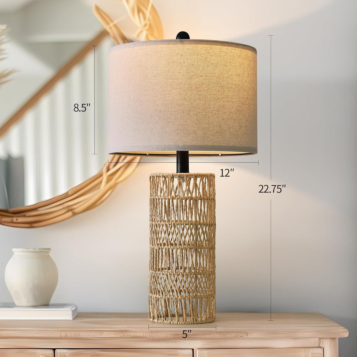 Angkasa Rattan Table Lamp — Woven rattan lamp base with a cylindrical fabric shade.