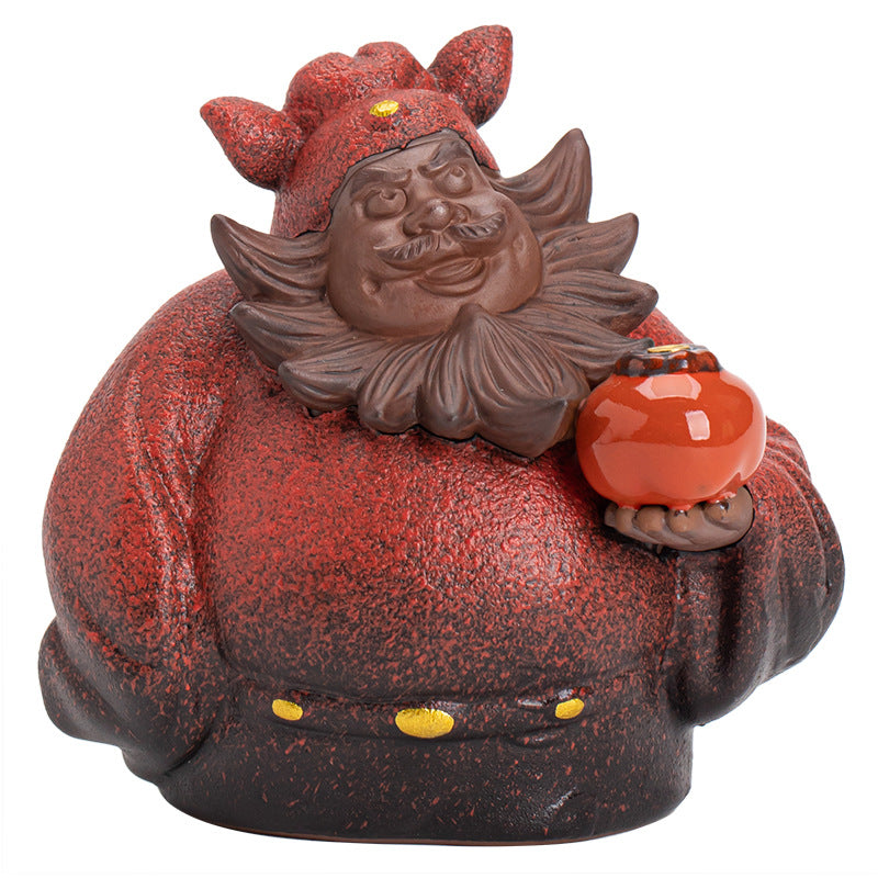 Ito Incense Holder — Red bearded-character ceramic incense holder.
