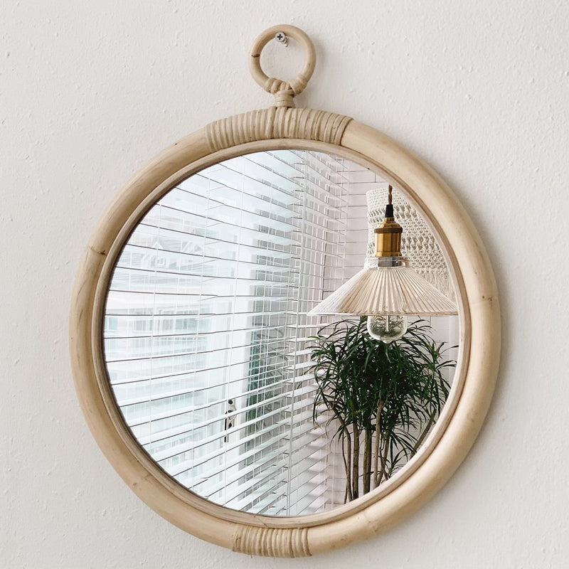 Batam Wall Mirror — Round bamboo-framed wall mirror with a hanging loop.