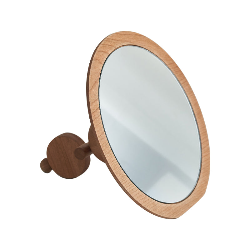Tianyu Cherry Wood Table Mirror — Round cherry-wood table mirror on a short sloping stand.
