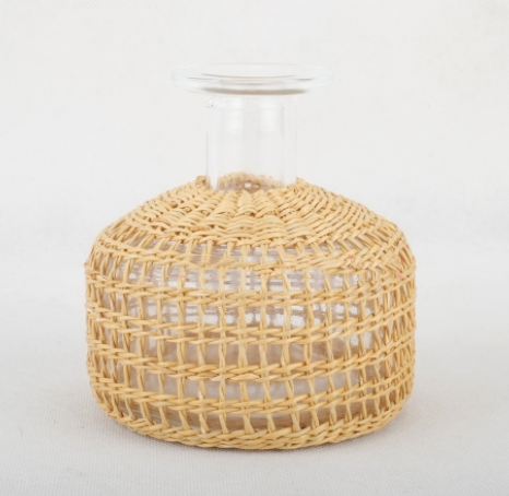 Hakone Vase — Rounded glass vase with a woven outer layer, model B.
