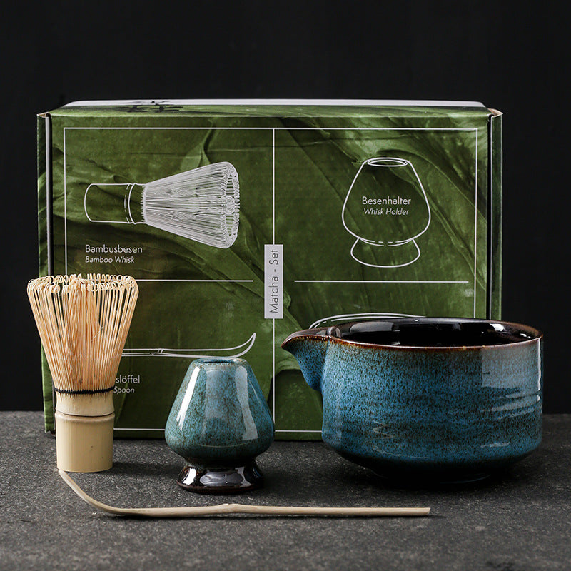 Hokuto Matcha Tea Set — Deep blue ceramic matcha bowl in a four-piece preparation set.