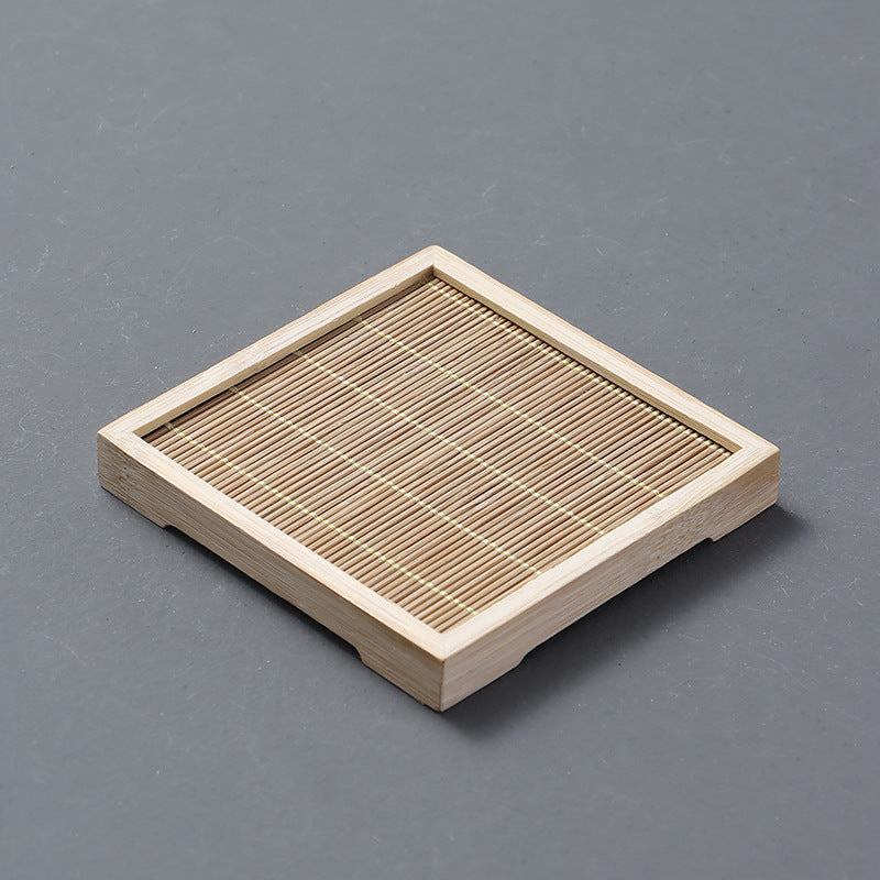 Xinhe Coaster — Square natural-coloured bamboo tea coaster.