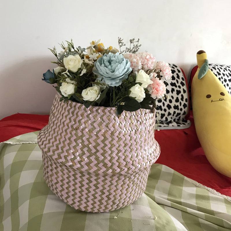 Azumi Storage Basket — Pink round woven flower basket.