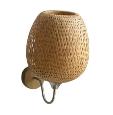 Feiyun Wall Light — Egg-shaped woven wall shade suspended from a wooden arm.