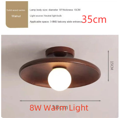 Izu Ceiling Light — Large wooden disc-cap ceiling light, in the selected warm-light configuration.